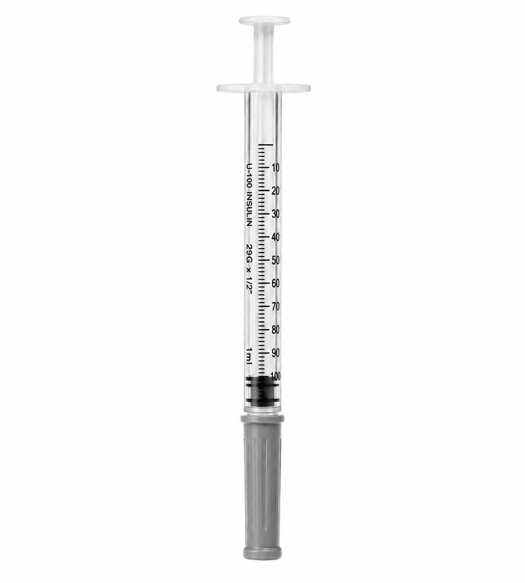 Medical syringe with measurement markings on a white background
