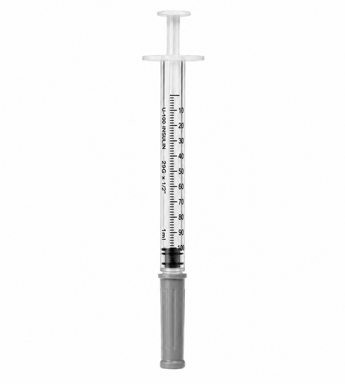 Medical syringe with measurement markings on a white background